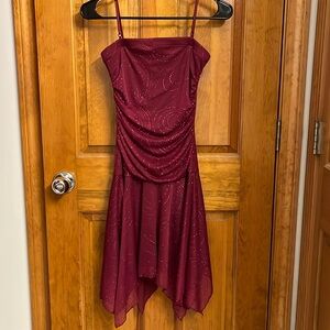 Size small dress. Berry in color with sparkle detail. Tagged and unworn.